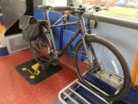 Bicycle on a rack on a bus